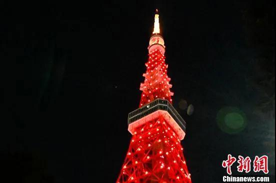 日本东京塔点亮中国红(资料图)
